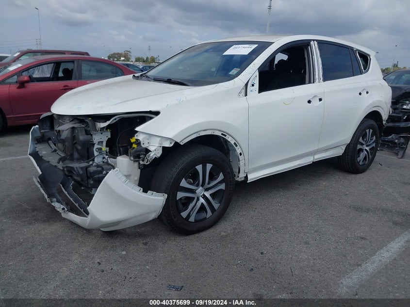 VIN JTMZFREV0JD115688 2018 TOYOTA RAV4 LE