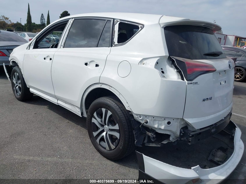 VIN JTMZFREV0JD115688 2018 TOYOTA RAV4 LE