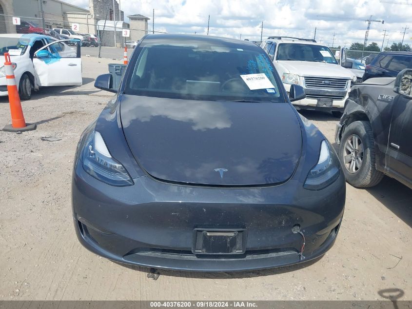 2023 Tesla Model Y Awd/Long Range Dual Motor All-Wheel Drive VIN: 7SAYGDEE3PA050610 Lot: 40376200