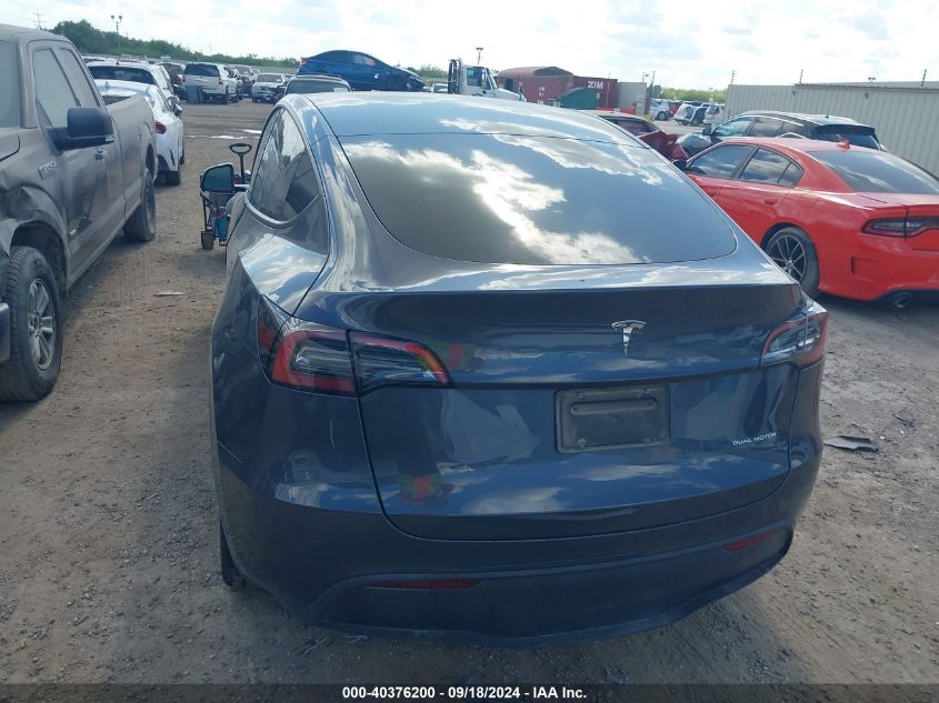 2023 Tesla Model Y Awd/Long Range Dual Motor All-Wheel Drive VIN: 7SAYGDEE3PA050610 Lot: 40376200