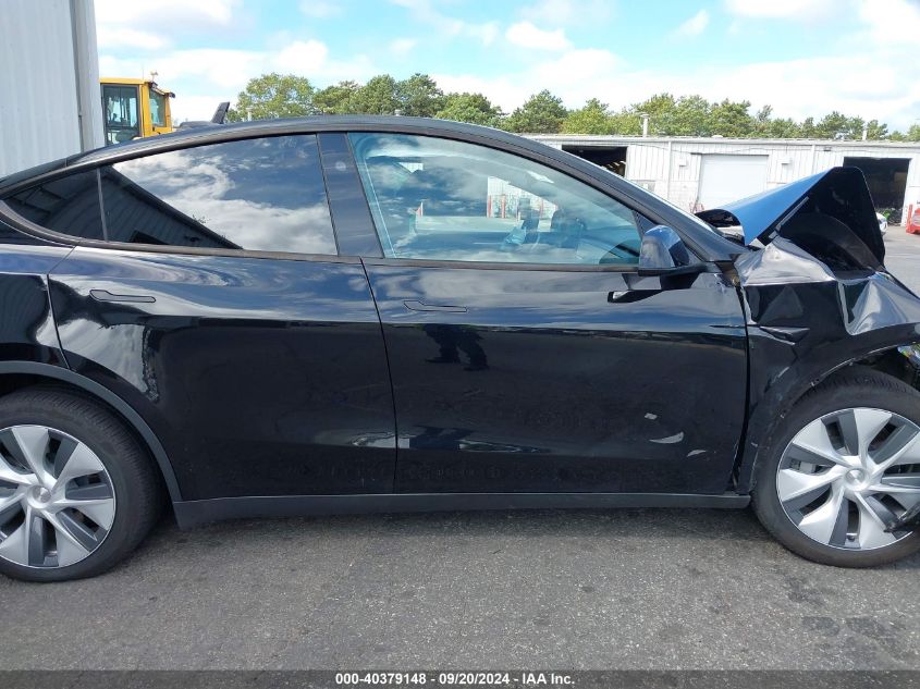 2023 Tesla Model Y Awd/Long Range Dual Motor All-Wheel Drive VIN: 7SAYGDEE2PA185156 Lot: 40379148