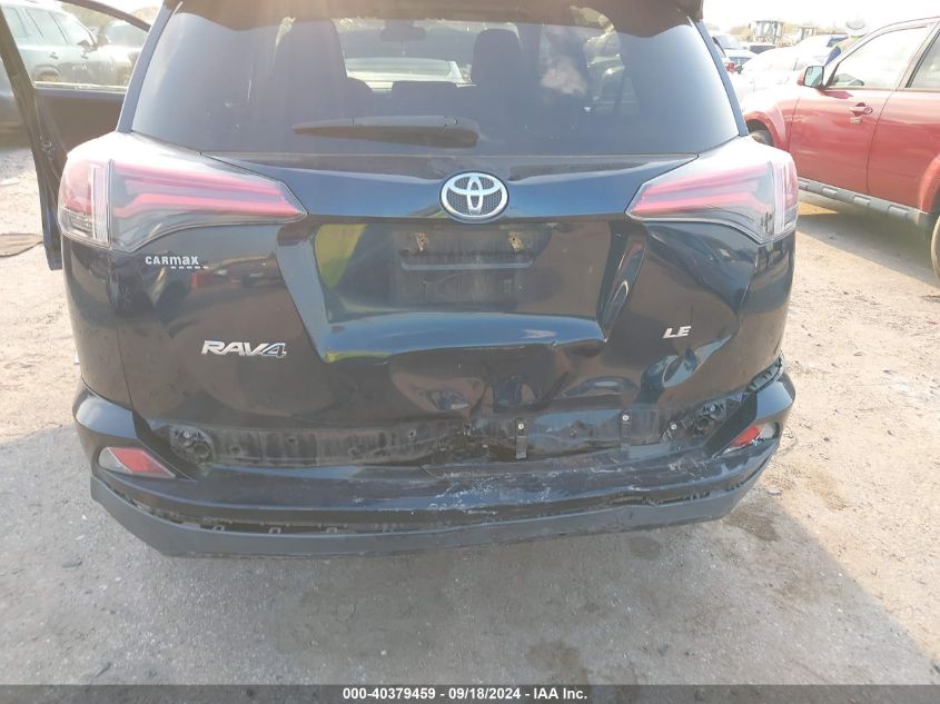 2T3ZFREV8HW360672 2017 Toyota Rav4 Le