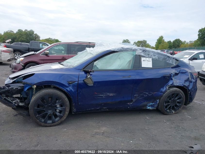 2023 Tesla Model Y Awd/Long Range Dual Motor All-Wheel Drive VIN: 7SAYGAEE1PF811491 Lot: 40379622