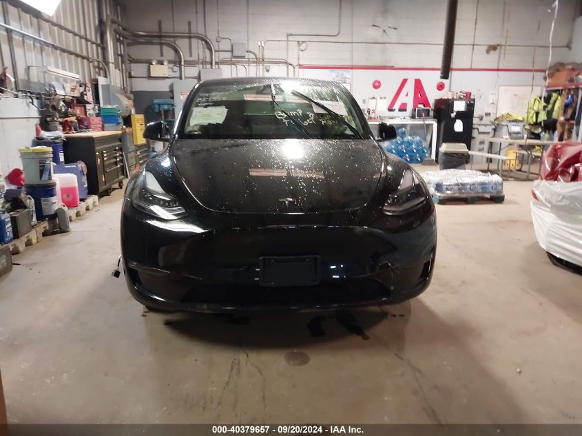 2023 Tesla Model Y Awd/Long Range Dual Motor All-Wheel Drive VIN: 7SAYGDEE9PF858558 Lot: 40379657