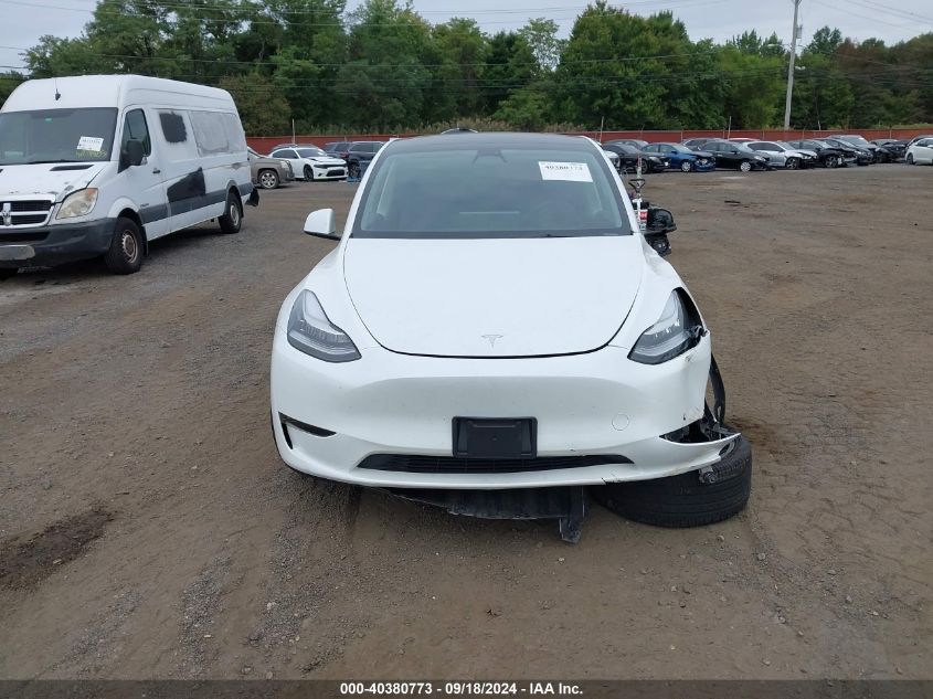 2023 Tesla Model Y Awd/Long Range Dual Motor All-Wheel Drive VIN: 7SAYGDEE9PA071235 Lot: 40380773