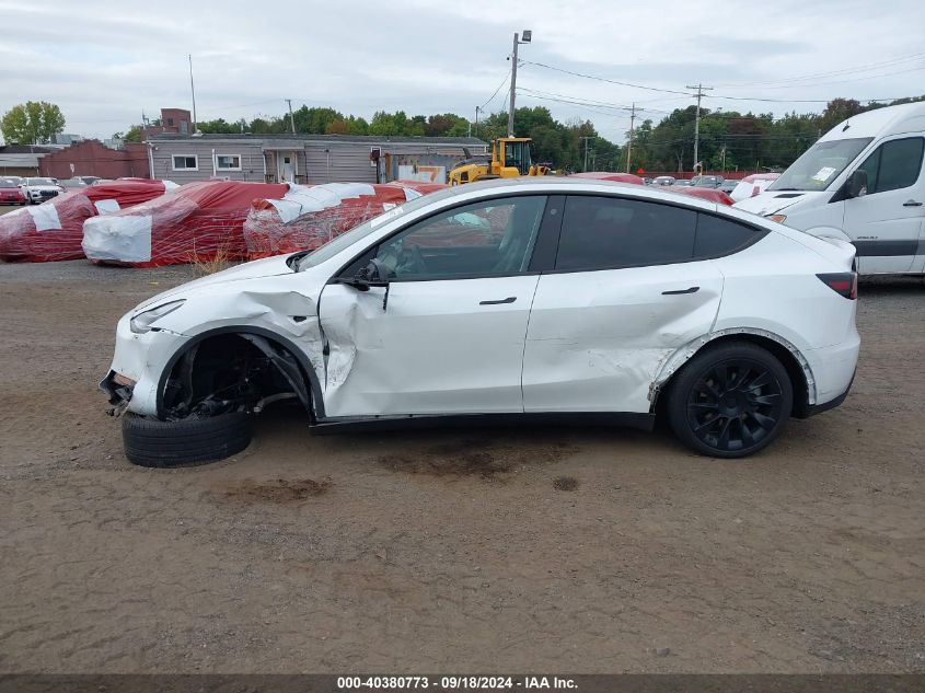 2023 Tesla Model Y Awd/Long Range Dual Motor All-Wheel Drive VIN: 7SAYGDEE9PA071235 Lot: 40380773