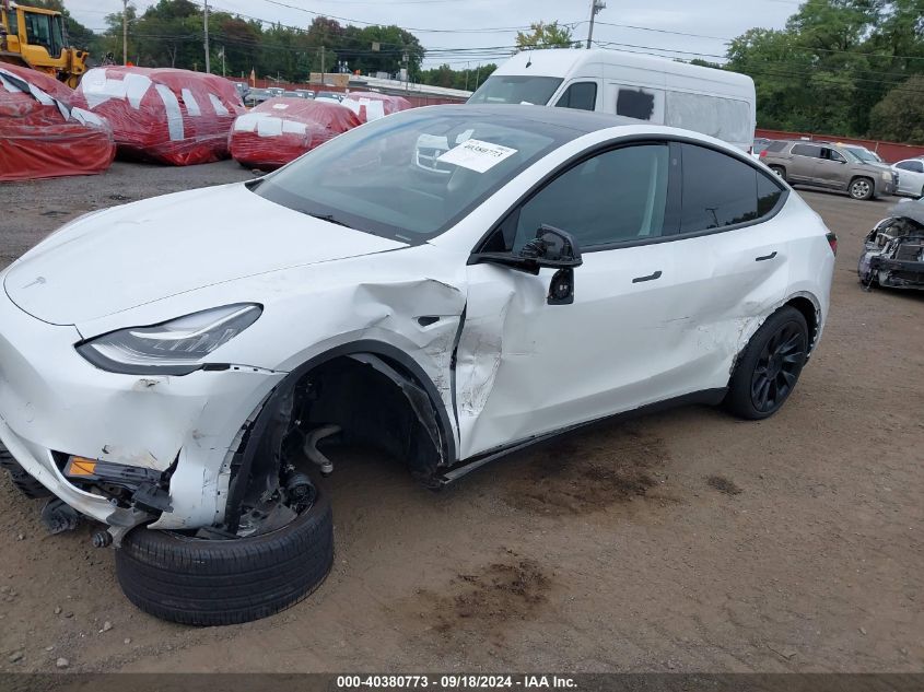 2023 Tesla Model Y Awd/Long Range Dual Motor All-Wheel Drive VIN: 7SAYGDEE9PA071235 Lot: 40380773