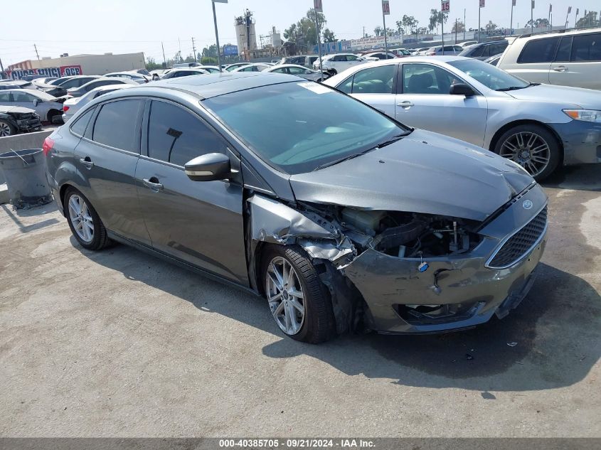 VIN 1FADP3F24FL263645 2015 FORD FOCUS no.1