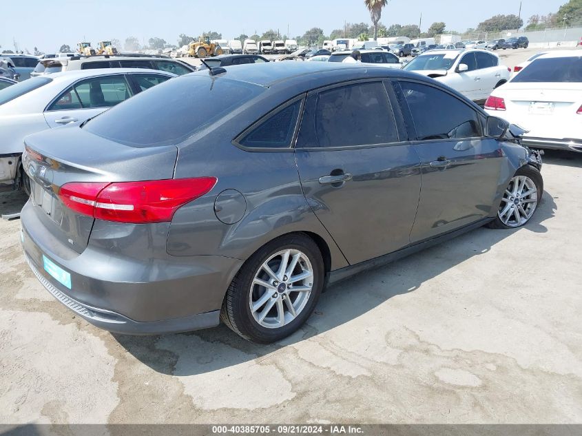 VIN 1FADP3F24FL263645 2015 FORD FOCUS no.4