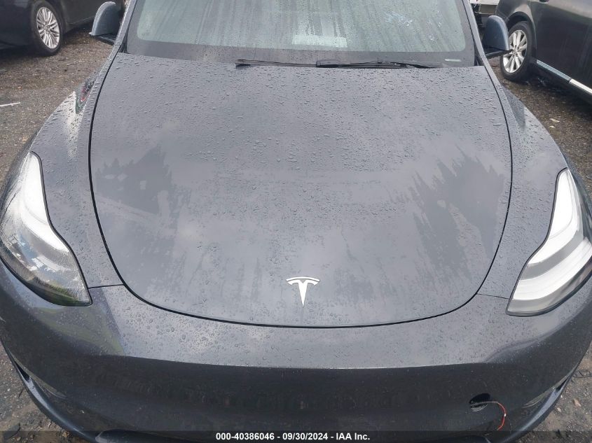 2023 Tesla Model Y VIN: 7SAYGDEE5PA071085 Lot: 40386046