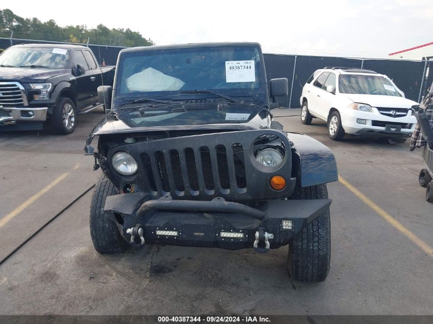 2008 Jeep Wrangler Unlimited Sahara VIN: 1J4GB59138L619973 Lot: 40387344