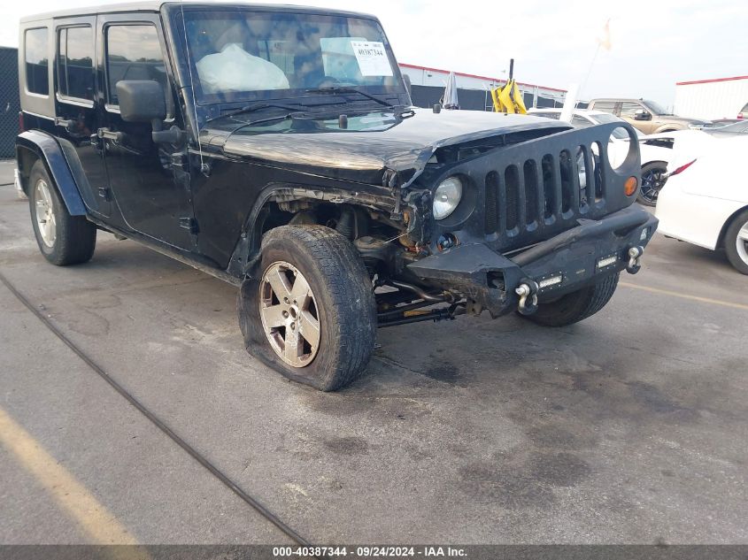 2008 Jeep Wrangler Unlimited Sahara VIN: 1J4GB59138L619973 Lot: 40387344