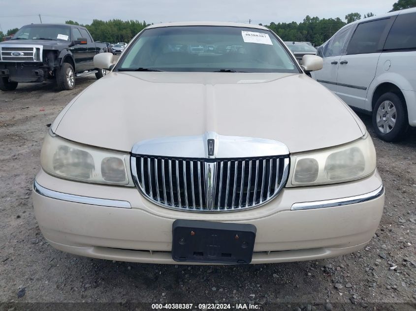 1999 Lincoln Town Car Cartier VIN: 1LNHM83W9XY706753 Lot: 40388387