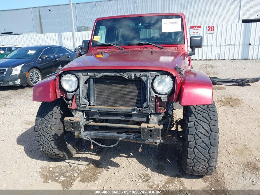 2011 Jeep Wrangler Unlimited Sahara VIN: 1J4HA5H15BL575586 Lot: 40388683