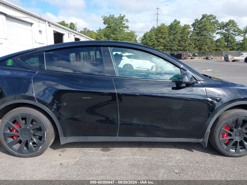 2023 Tesla Model Y Awd/Long Range Dual Motor All-Wheel Drive VIN: 7SAYGDEE2PF842833 Lot: 40390647