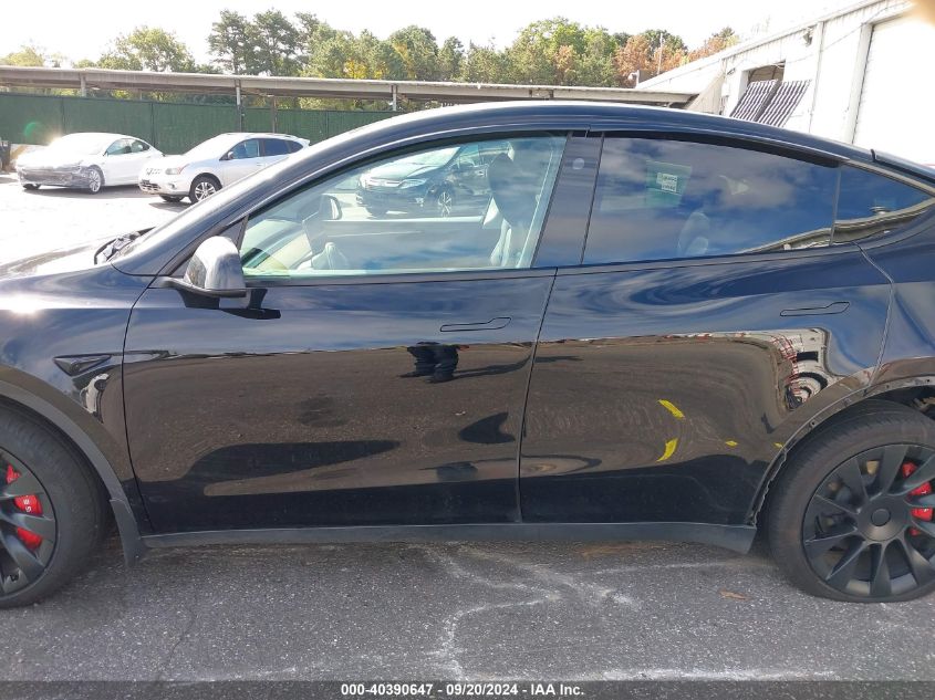 2023 Tesla Model Y Awd/Long Range Dual Motor All-Wheel Drive VIN: 7SAYGDEE2PF842833 Lot: 40390647