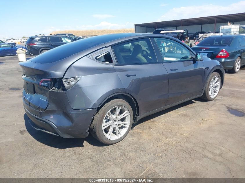 VIN 7SAYGAEE6PF967509 2023 TESLA MODEL Y no.4