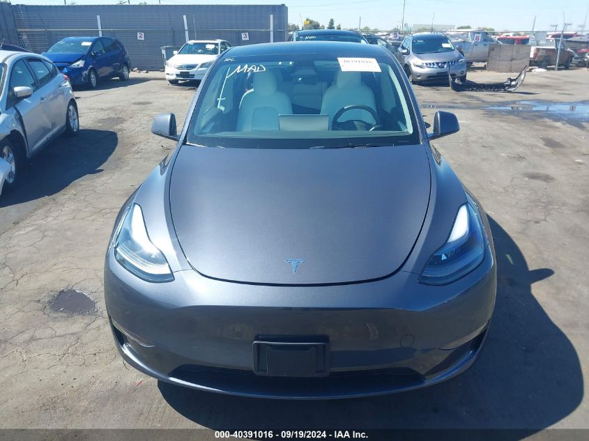 2023 Tesla Model Y Awd/Long Range Dual Motor All-Wheel Drive VIN: 7SAYGAEE6PF967509 Lot: 40391016