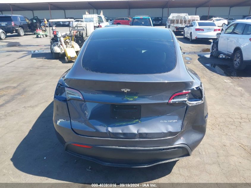 2023 Tesla Model Y Awd/Long Range Dual Motor All-Wheel Drive VIN: 7SAYGAEE6PF967509 Lot: 40391016