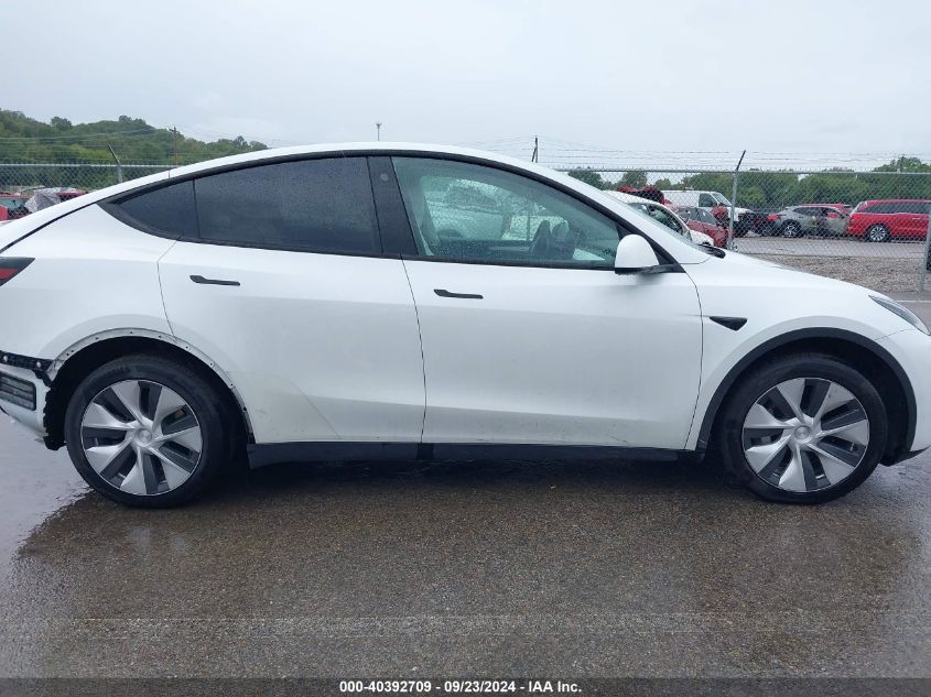 2023 Tesla Model Y Awd/Long Range Dual Motor All-Wheel Drive VIN: 7SAYGDEE5PF712612 Lot: 40392709