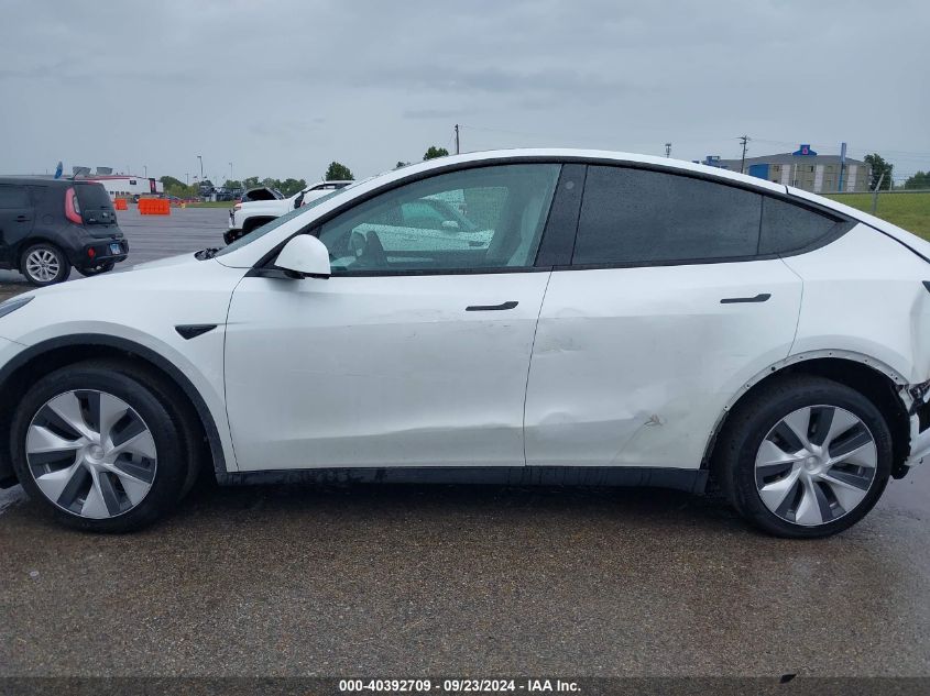 2023 Tesla Model Y Awd/Long Range Dual Motor All-Wheel Drive VIN: 7SAYGDEE5PF712612 Lot: 40392709