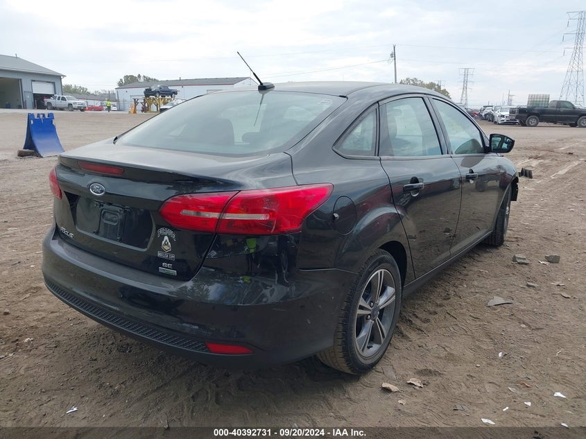 VIN 1FADP3FE8JL233972 2018 FORD FOCUS SE
