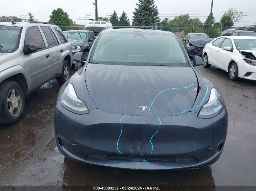 2023 Tesla Model Y Awd/Long Range Dual Motor All-Wheel Drive VIN: 7SAYGDEE3PF878417 Lot: 40393257