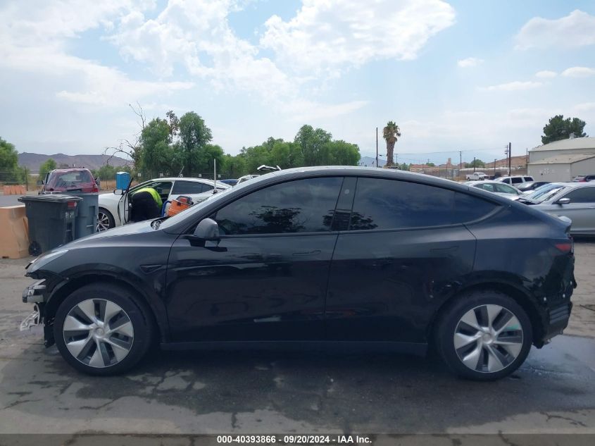 2023 Tesla Model Y Awd/Long Range Dual Motor All-Wheel Drive VIN: 7SAYGAEE0PF859337 Lot: 40393866