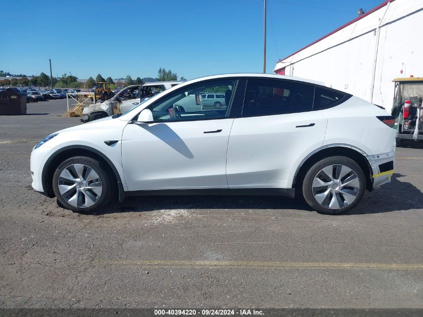 2023 Tesla Model Y Awd/Long Range Dual Motor All-Wheel Drive VIN: 7SAYGDEE4PA147931 Lot: 40394220