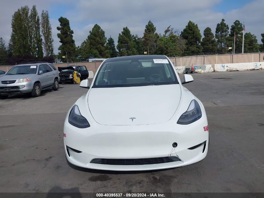 2023 Tesla Model Y Awd/Long Range Dual Motor All-Wheel Drive VIN: 7SAYGAEE8PF812623 Lot: 40395537