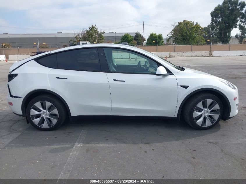 2023 Tesla Model Y Awd/Long Range Dual Motor All-Wheel Drive VIN: 7SAYGAEE8PF812623 Lot: 40395537