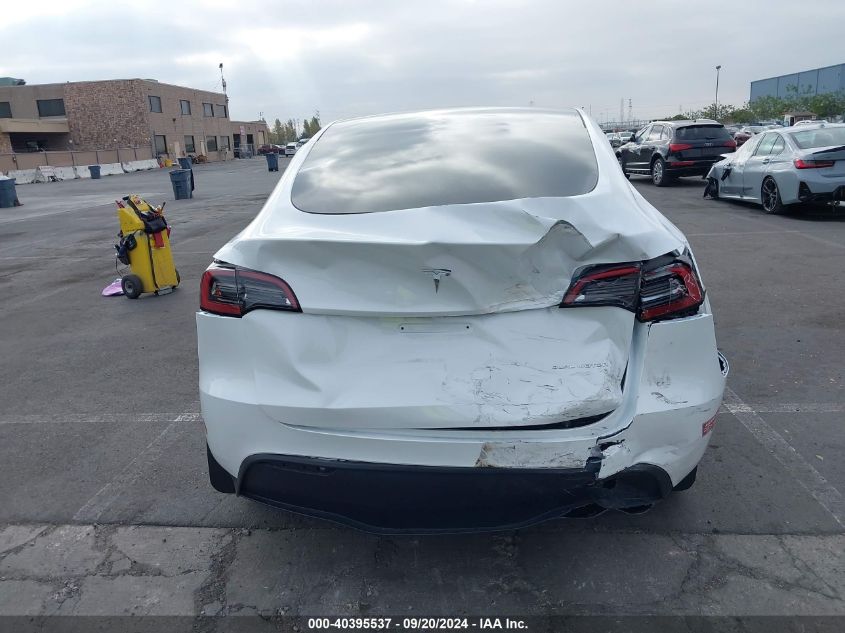 2023 Tesla Model Y Awd/Long Range Dual Motor All-Wheel Drive VIN: 7SAYGAEE8PF812623 Lot: 40395537