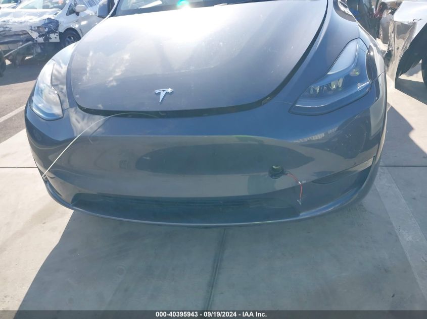 2023 Tesla Model Y Awd/Long Range Dual Motor All-Wheel Drive VIN: 7SAYGDEE8PF920614 Lot: 40395943