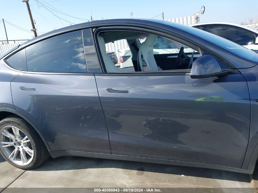 2023 Tesla Model Y Awd/Long Range Dual Motor All-Wheel Drive VIN: 7SAYGDEE8PF920614 Lot: 40395943