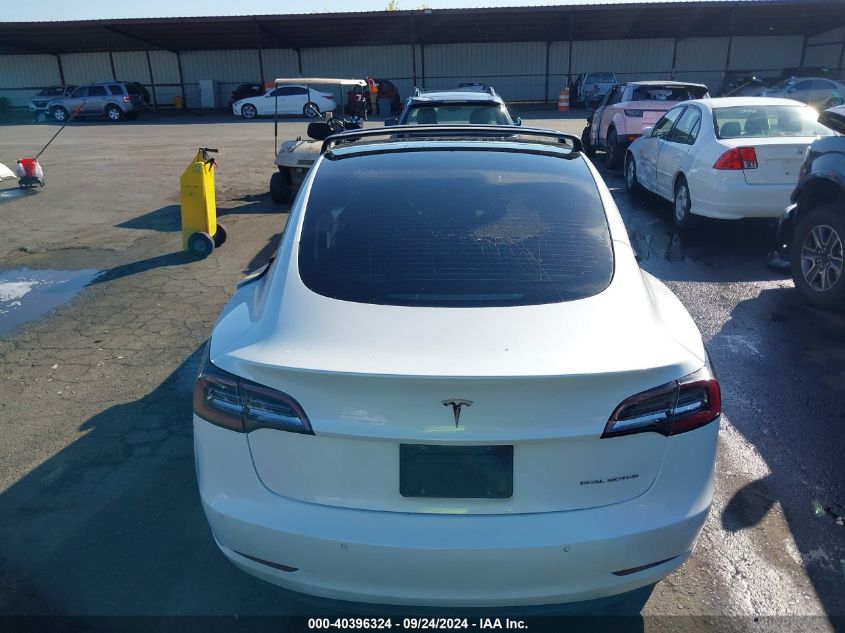 2021 Tesla Model 3 Long Range Dual Motor All-Wheel Drive VIN: 5YJ3E1EB9MF936818 Lot: 40396324