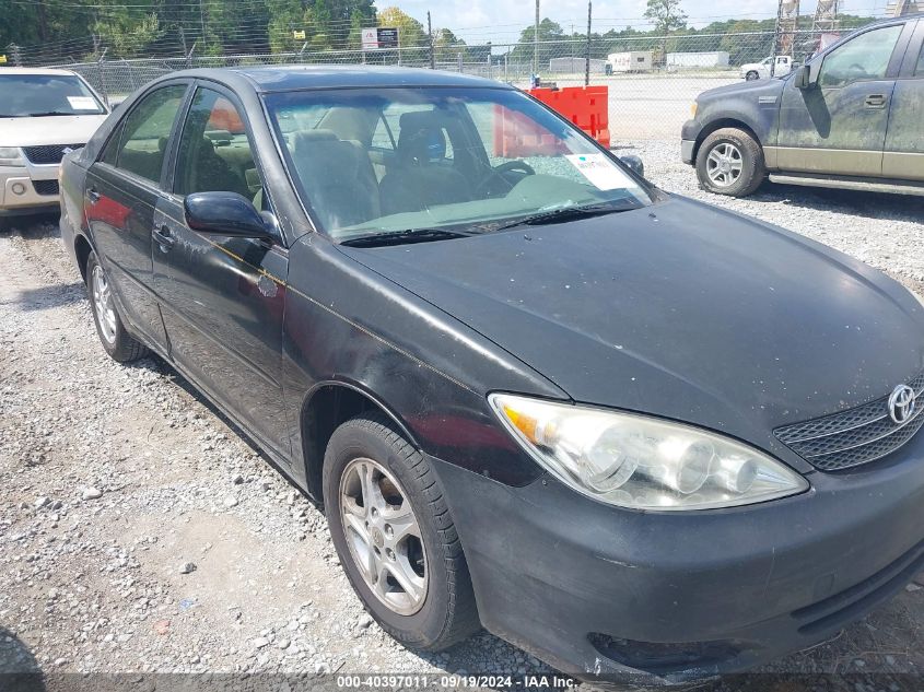 2003 Toyota Camry Le VIN: JTDBE32K930239450 Lot: 40397011