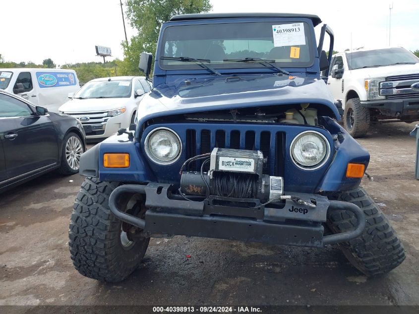 2000 Jeep Wrangler Sport VIN: 1J4FA49SXYP800739 Lot: 40398913