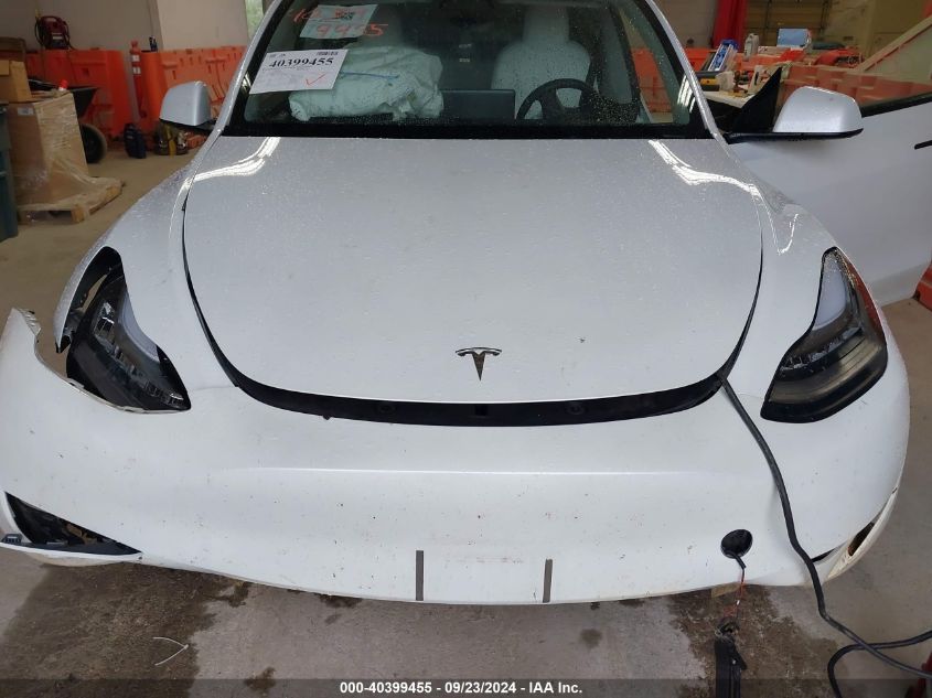 2023 Tesla Model Y VIN: 7SAYGDEE7PA100523 Lot: 40399455