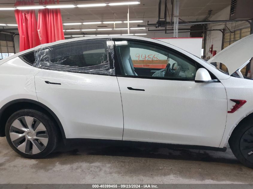 2023 Tesla Model Y VIN: 7SAYGDEE7PA100523 Lot: 40399455