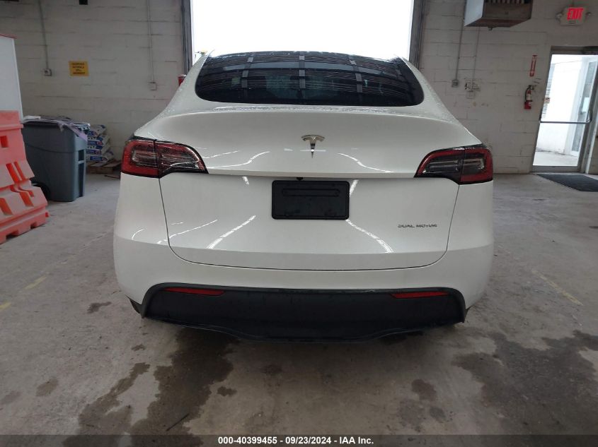 2023 Tesla Model Y VIN: 7SAYGDEE7PA100523 Lot: 40399455