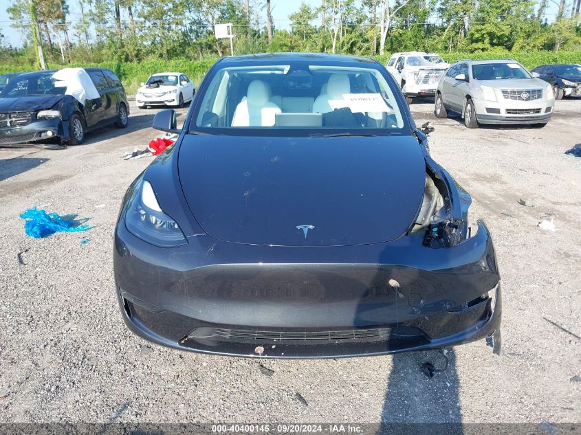 2024 Tesla Model Y Long Range Dual Motor All-Wheel Drive/Rwd VIN: 7SAYGDED1RF084462 Lot: 40400145