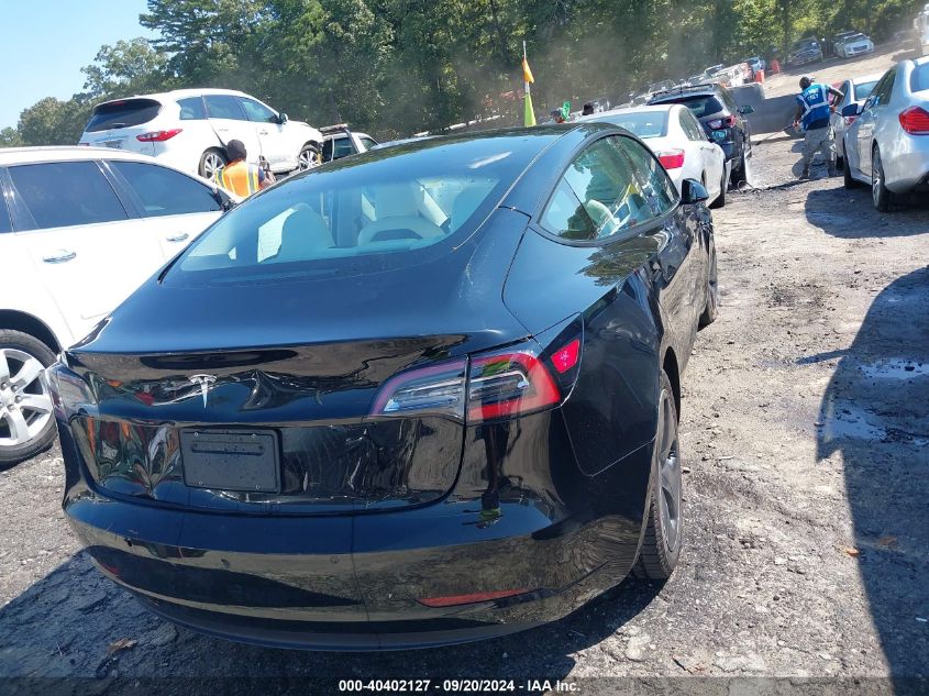 2021 TESLA MODEL 3 STANDARD RANGE PLUS REAR-WHEEL DRIVE - 5YJ3E1EA7MF084492