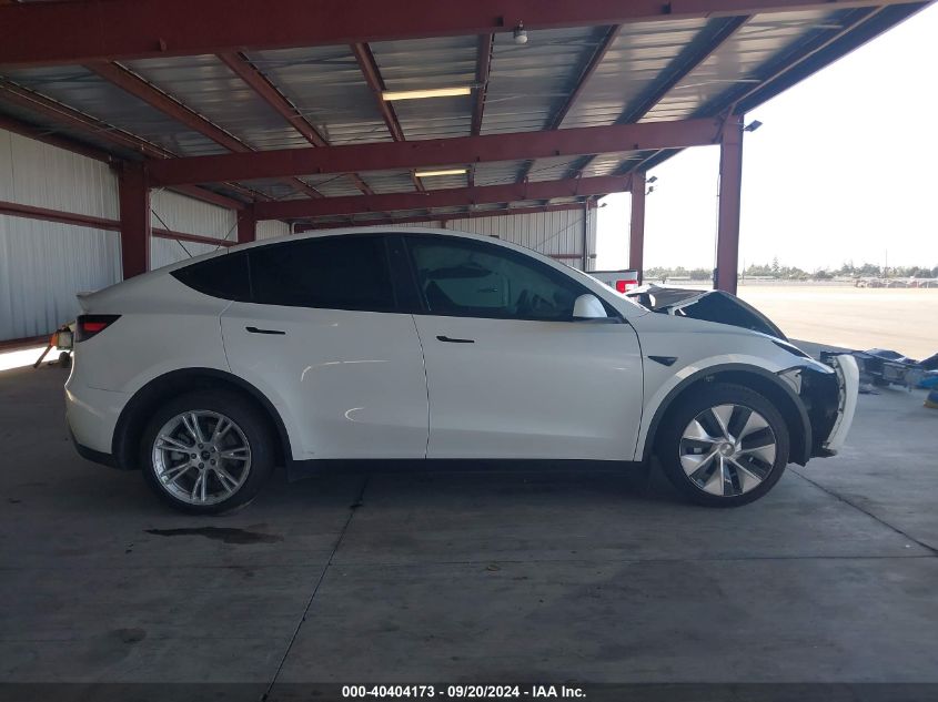 2023 Tesla Model Y Awd/Long Range Dual Motor All-Wheel Drive VIN: 7SAYGDEE2PF675311 Lot: 40404173