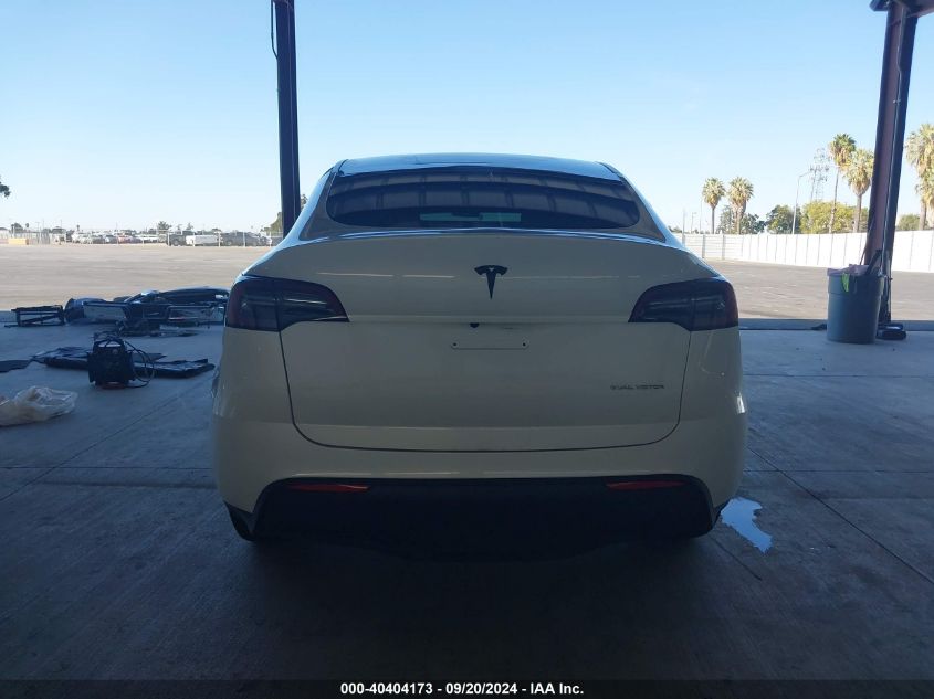 2023 Tesla Model Y Awd/Long Range Dual Motor All-Wheel Drive VIN: 7SAYGDEE2PF675311 Lot: 40404173