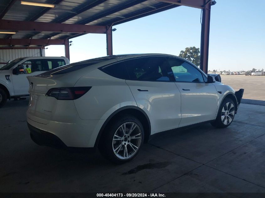 VIN 7SAYGDEE2PF675311 2023 Tesla Model Y, Awd/Long... no.4