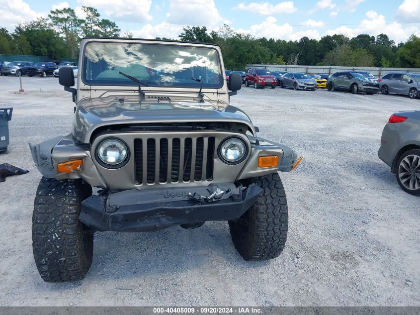 2004 Jeep Wrangler Unlimited VIN: 1J4FA49SX4P779868 Lot: 40405009