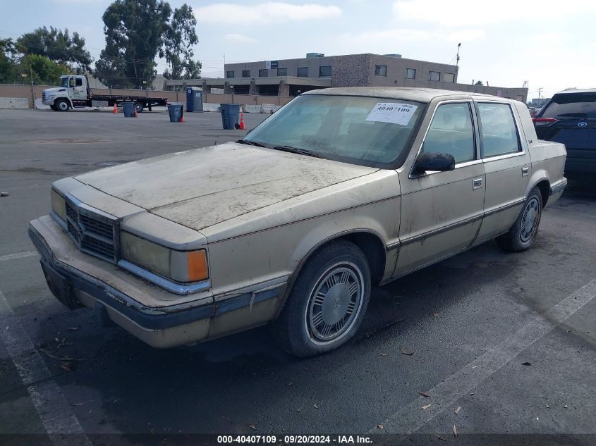 1990 Dodge Dynasty VIN: 1B3XC4635LD785726 Lot: 40407109