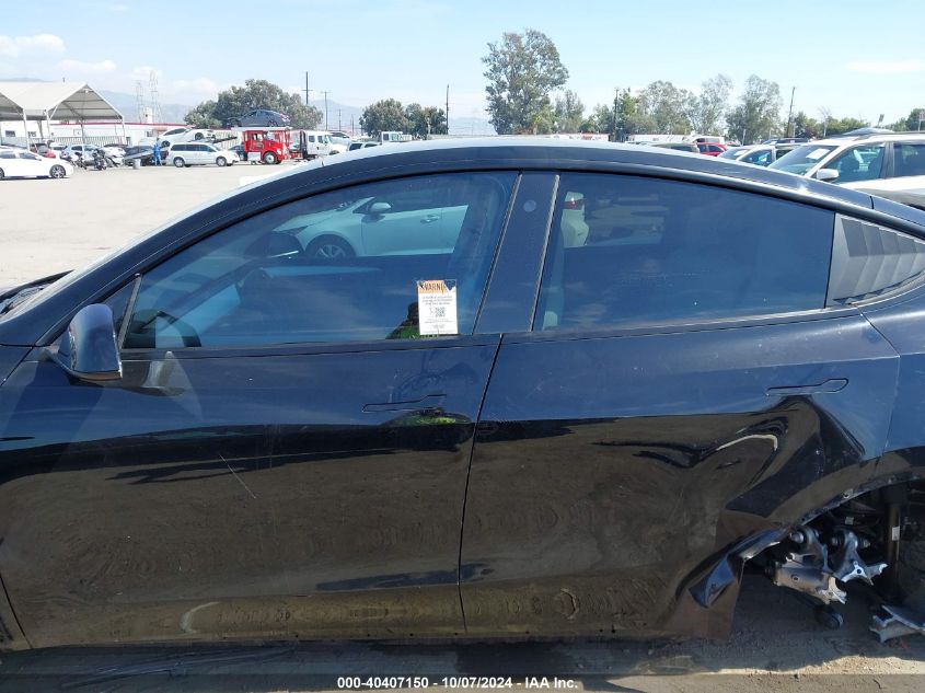 2023 Tesla Model Y Awd/Performance Dual Motor All-Wheel Drive VIN: 7SAYGDEF2PF602979 Lot: 40407150