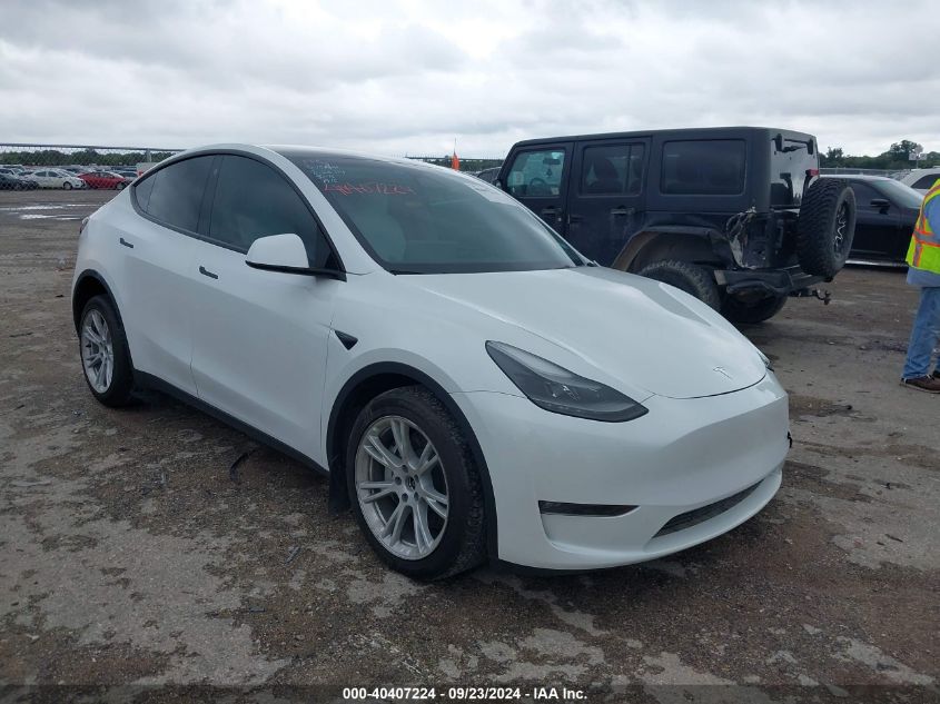 VIN 7SAYGAEEXPF660828 2023 Tesla Model Y, Awd/Long... no.1