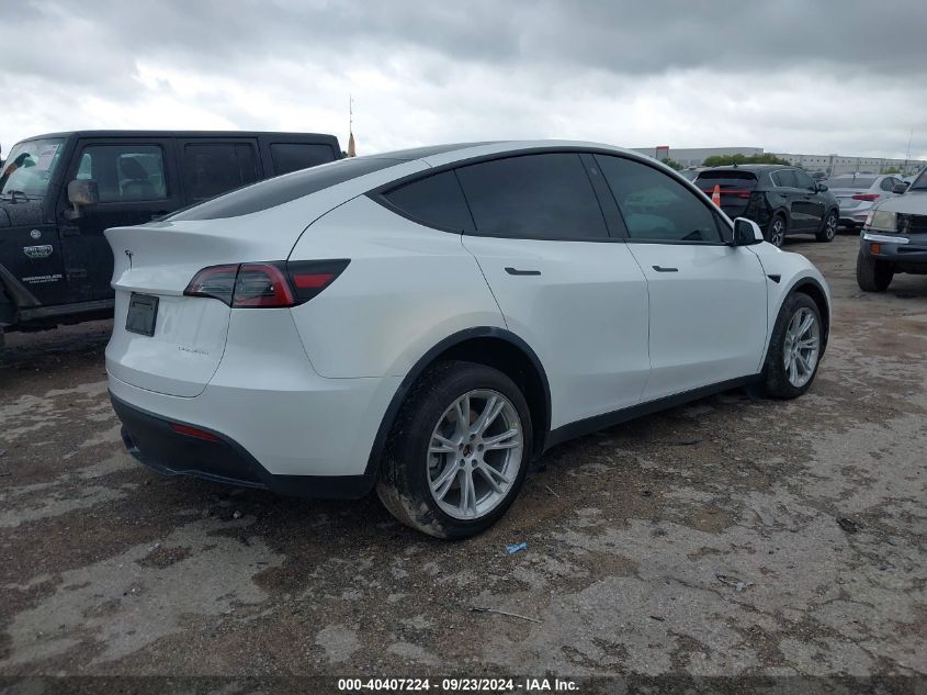 VIN 7SAYGAEEXPF660828 2023 Tesla Model Y, Awd/Long... no.4